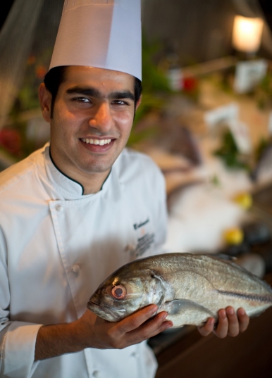 Chef Mahmood Said Humaid Al Shibli of Bait Al Bahr is about to cook the catch of the day