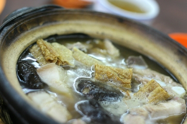 Bak kut teh is a meat dish cooked in broth popularly served in Malaysia